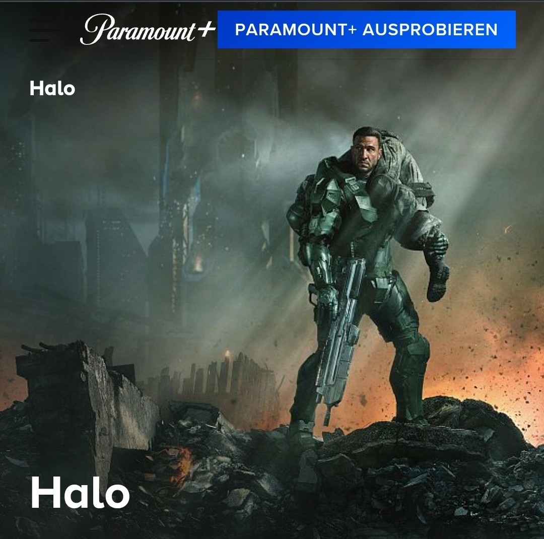 Screenshot of Website from Paramount Plus showing the Master Chief 117 standing at on top of a debris Hill with an unknown Soldier of his shoulder and the famous BR in a hand.