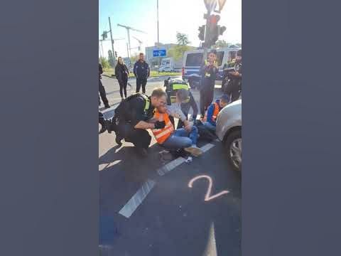 Thumbnail of a Video Short on YouTube showing German Police how they deal with so called Eco-Protester.